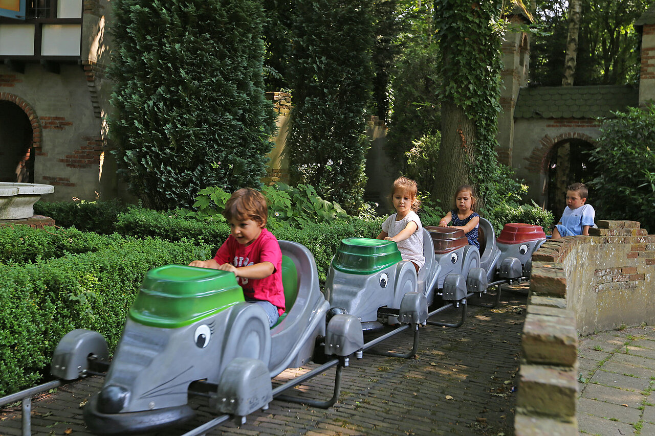 Rijden in een traprat over het dorpsplein